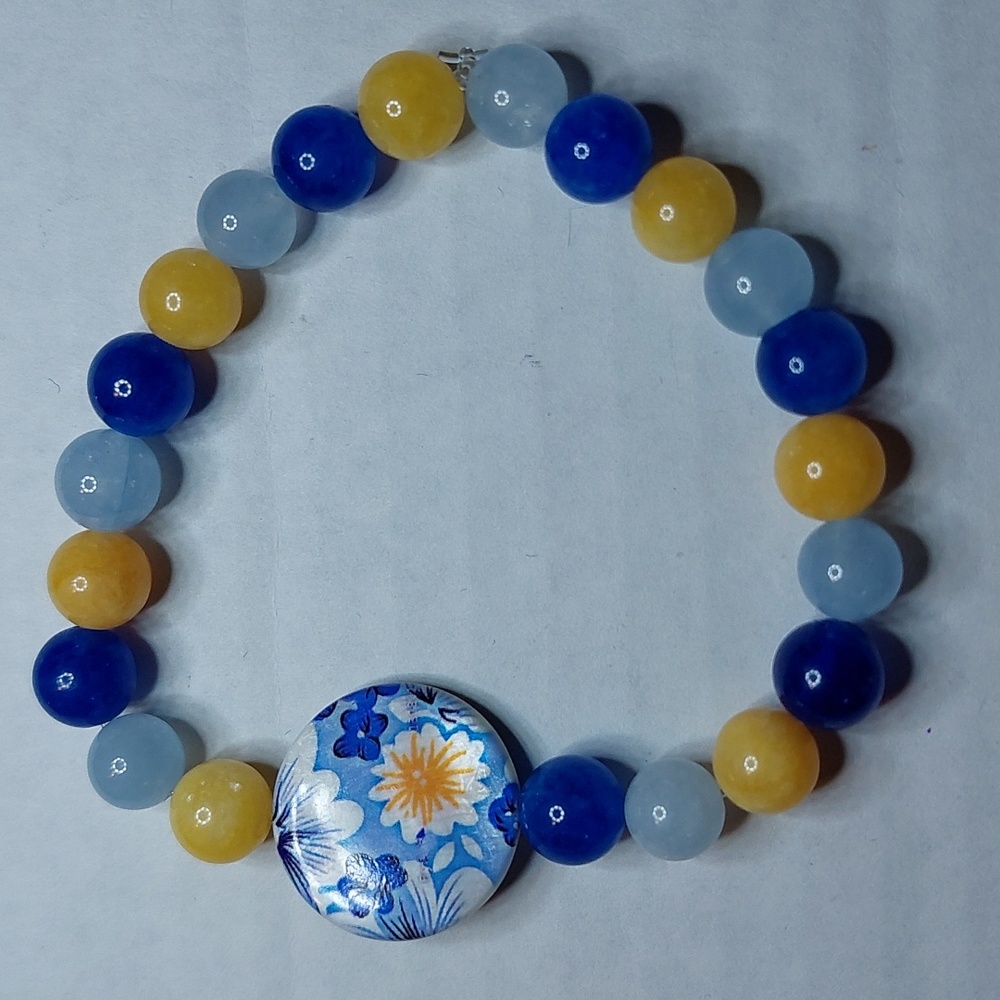 Shell center bead. Blue Jade/Yellow Beeswax Jade/Aquamarine stone beaded bracel